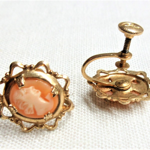 Vintage Coro cameo screw back earrings set,  Cameos set in gold tone metal are about 3/4" tall in good used condition