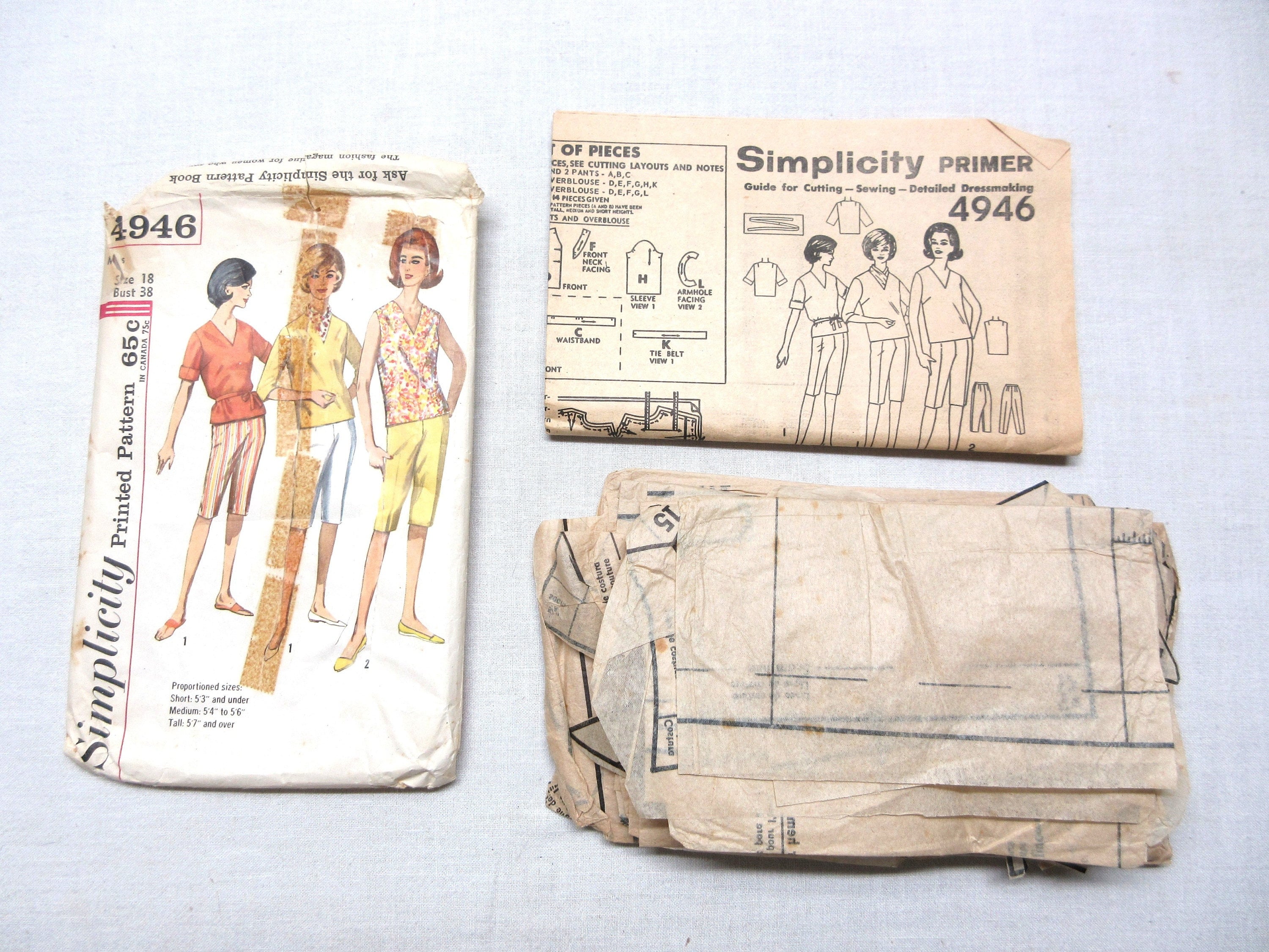 1960s size 18 Misses cabin boy pants and top pattern. Used Simplicity #4946  with instruction sheet and 14 printed pattern pieces. Complete
