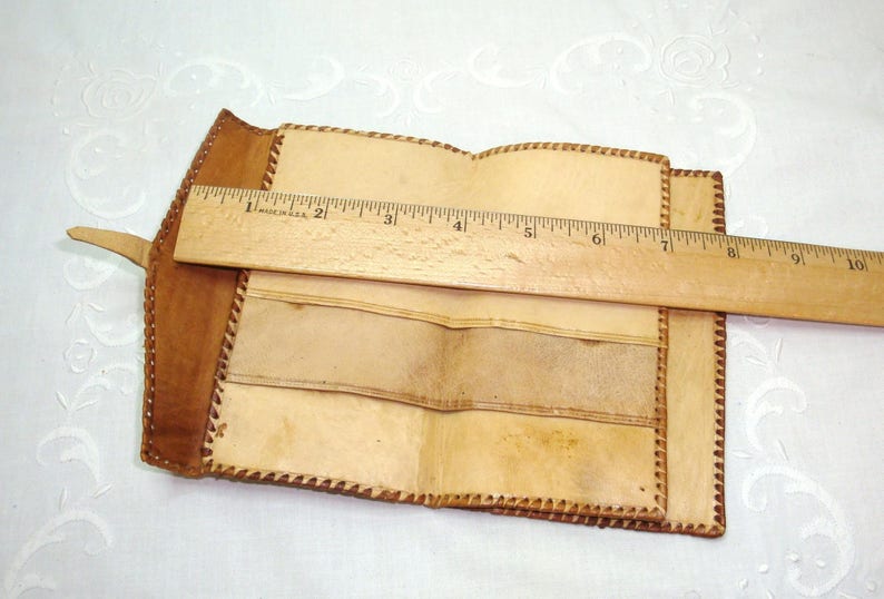 Soft Supple Tooled and painted cover depicts a domesticated camel 5.5 Leather Wallet In good condition 7 pocket desert theme