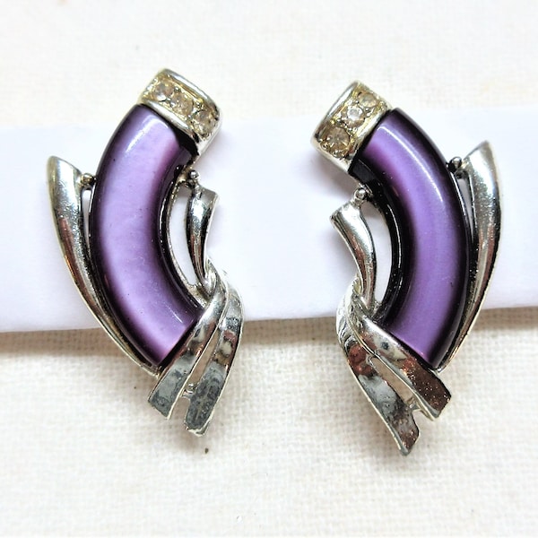 Signed Coro clip on earrings, purple with rhinestone accents set in silver tone metal.  1.5" earrings in good used condition.