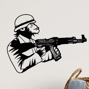 May include: Black and white illustration of a monkey wearing a helmet and holding a rifle.