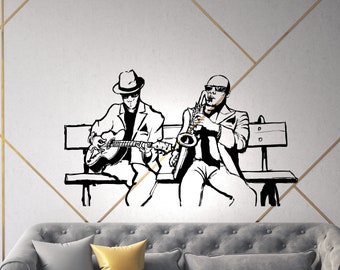 Musicien De Jazz Jouant Du Saxophone Sur Une Scène Faiblement éclairée