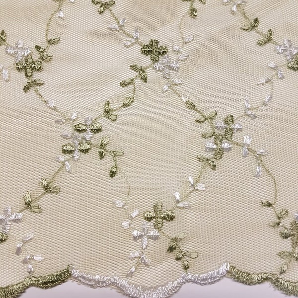 Vintage embroidered  lace fabric with scalloped borders