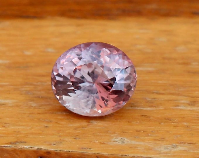 Certified Color-Change Pink Sapphire 1.56 Carat Oval Cut Gemstone, Engagement Ring September Birthstone.