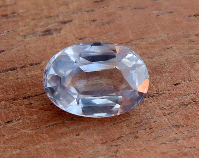 GSI Certified Pastel Blue Sapphire: 1.22 Carat Oval Cut Gemstone
