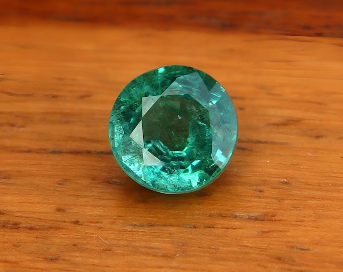 Certified Natural Emerald Loose Gemstone: 0.76 Carat Round Cut, May Birthstone