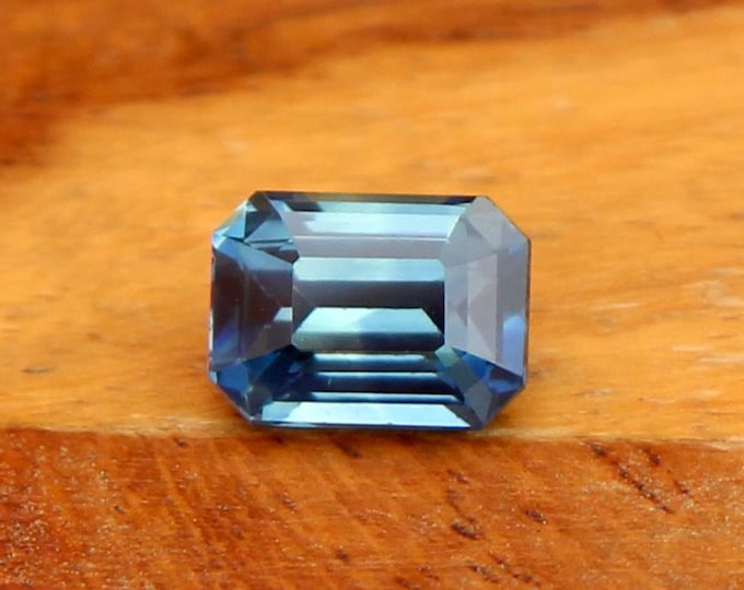 GSI Certified Greenish Blue Sapphire: 1.56 Carat Emerald Cut Loose Gemstone
