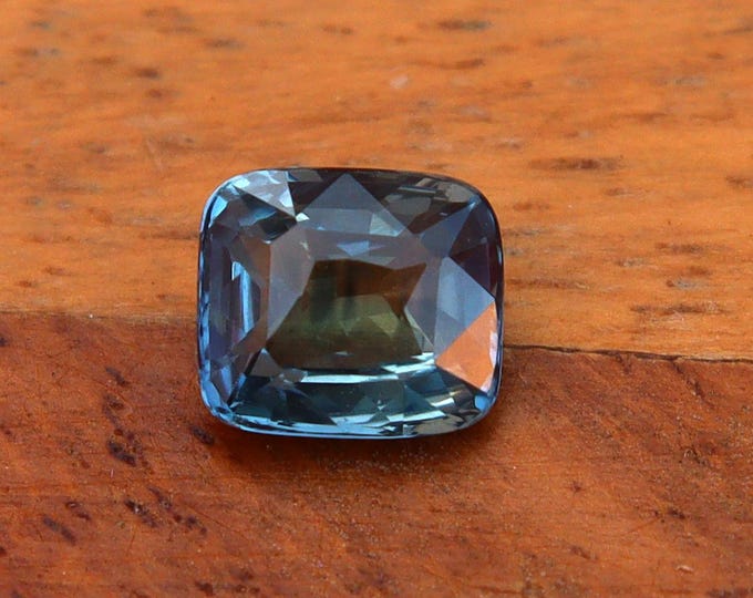 GSI Certified Teal Sapphire: 1.01 Carat Cushion Cut Gemstone