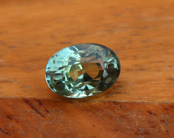 GSI Certified Green Teal Sapphire: 1.04 Carat Oval Cut Loose Gemstone