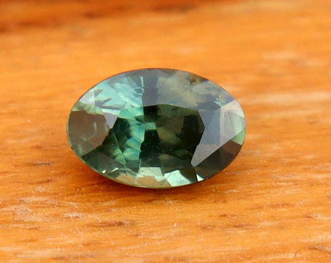 GSI Certified Teal Green Sapphire: 0.69 Carat Oval Cut Gemstone, Engagement Ring