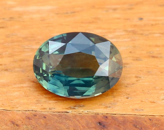 GSI Certified Teal Sapphire: 1.52 Carat Oval Cut Gemstone, Engagement Ring