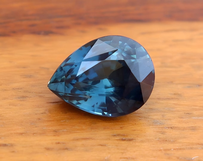GSI Certified Teal Sapphire: 1.29 Carat Pear Cut Gemstone