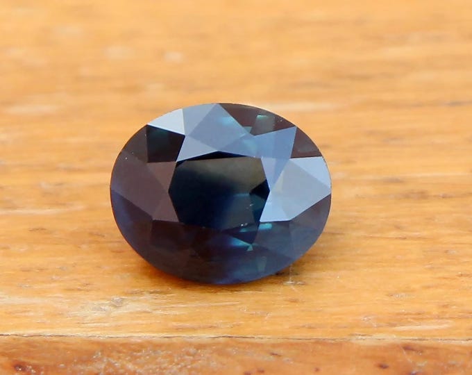 GSI Certified Dark Teal Sapphire: 1.52 Carat Oval Cut Gemstone, Engagement Ring