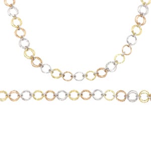 May include: A necklace and bracelet set featuring a chain design with alternating gold, silver, and rose gold colored circular links. The jewelry is displayed against a white background.