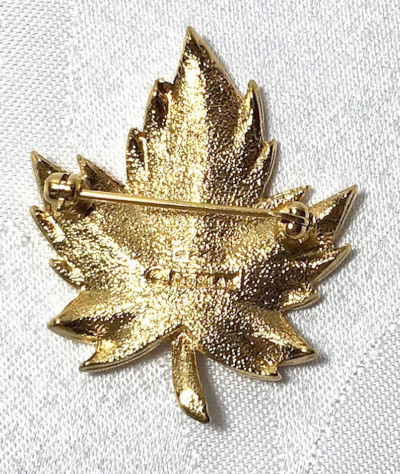 Vintage gold tone Maple leaf brooch signed D\u2019Orlan 9247 1.5 inches