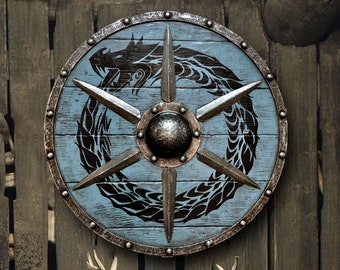 Escudo vikingo desgastado por la batalla de Ouroboros