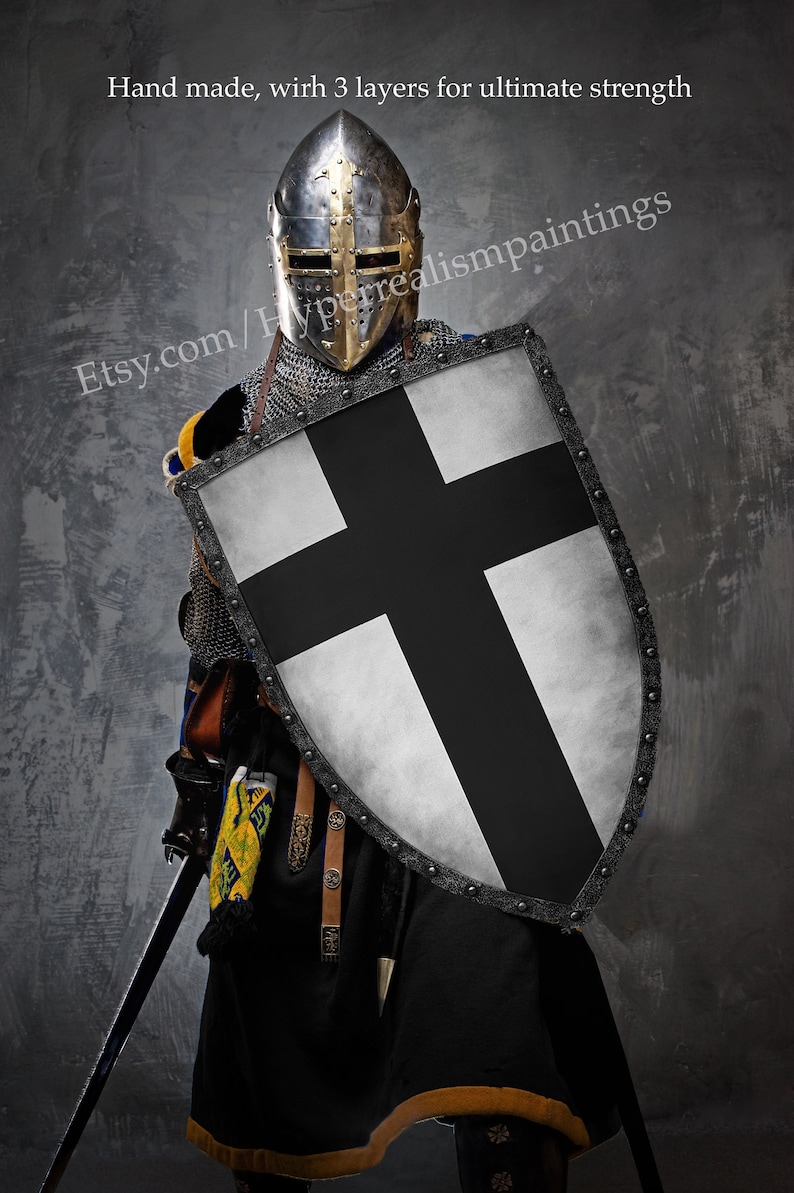 May include: A medieval knight in full armor, including a helmet, chainmail, and a shield with a black cross on a white background. The image includes the text "Hand made, with 3 layers for ultimate strength" and the Etsy shop URL.