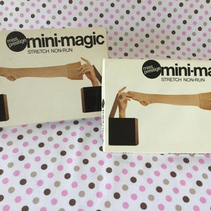 May include: Two boxes of "Miss Prestige mini-magic STRETCH NON-RUN" hosiery. The boxes are white with black text and a graphic of a leg being stretched. The boxes are on a pink and white polka dot background.