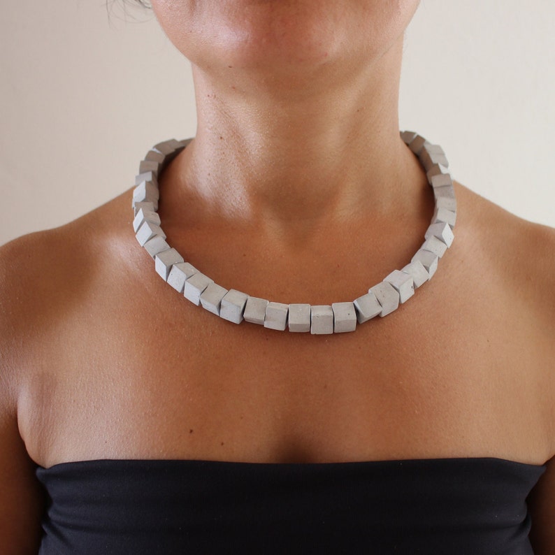 Geometric necklace with concrete cubic beads. Architecture to wear from the modern jewellery collection by ORTOGONALE image 2