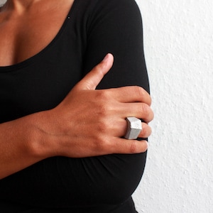 Material ring from the concrete jewelry collection by ORTOGONALE ideal as gift for architects