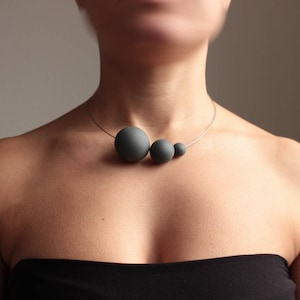 Minimal necklace PLUTONE from the modern jewelry collection SATELLITE. Black cobalt porcelain, simple unique choker, contemporary jewelry