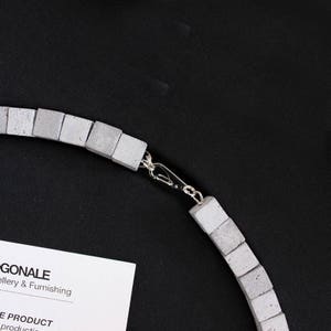 Geometric necklace with concrete cubic beads. Architecture to wear from the modern jewellery collection by ORTOGONALE image 7