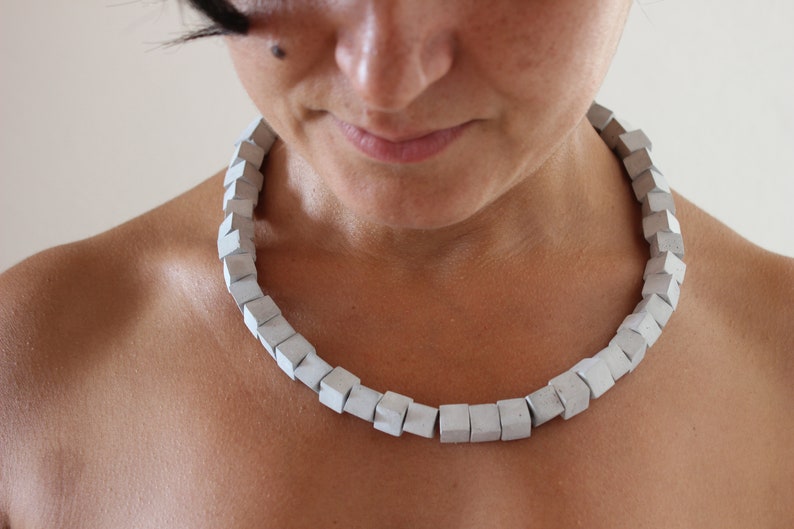 Geometric necklace with concrete cubic beads. Architecture to wear from the modern jewellery collection by ORTOGONALE image 1