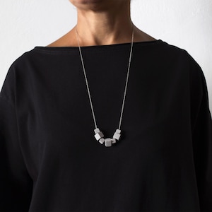 Geometric Necklace made of Concrete cubes and Italian Silver Chain from Arezzo | Wearable architecture by  ORTOGONALE