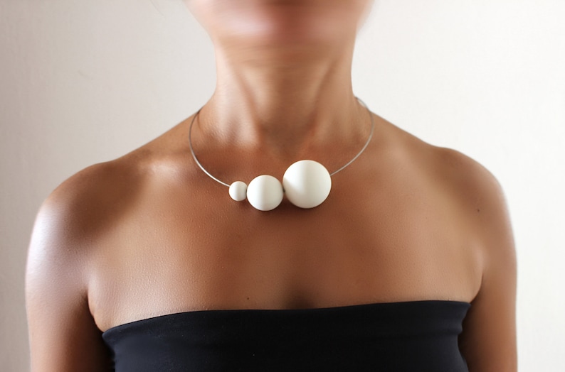 Contemporary porcelain necklace PLUTONE. Geometric necklace from the modern jewellery collection SATELLITE by ORTOGONALE image 1