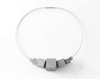 Statement necklace with interchangeable concrete modules. Geometric necklace from the contemporary jewellery collection by ORTOGONALE