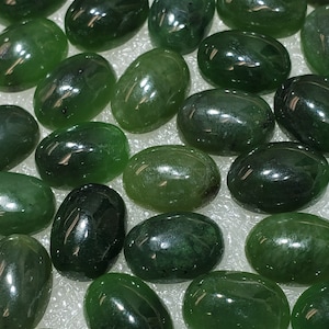 Natural and Powerful Russian nephrite jade pair 2 cabochons size 10 x 14 mm Weight  about 12 Carats