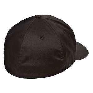May include: A black fitted baseball cap with a curved brim. The cap is made of a soft, smooth fabric.