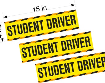 May include: Three yellow and black warning signs with the text "STUDENT DRIVER" in black letters. Each sign is 15 inches long and 4 inches wide.
