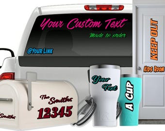 May include: A set of customizable vinyl decals featuring various designs. The decals are shown applied to a white truck, a mailbox, a door, and two tumblers. The decals include text such as "Your Custom Text", "The Smiths", "12345", "Your Text", "A Cup", "Keep Out", and "Kids Room".