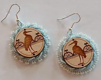 hand beaded earrings heron design wood center