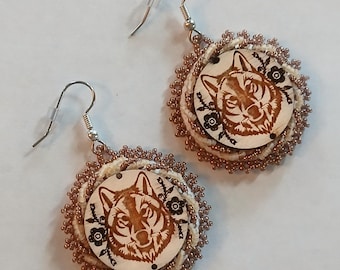 hand beaded earrings wolf design wood center
