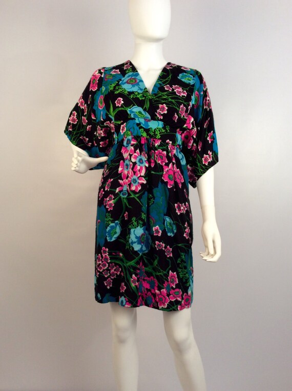 pink dress with black flowers
