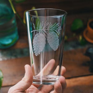 Pine Cone Glasses | Personalized Engraved Beer, Cocktail, Whiskey, Wine glassware. Pine Cone Tree gift. Mountain Cabin barware home decor.
