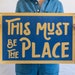 This Must Be The Place Felt Banner | Talking Heads inspired wall art gift. Vintage typography camp flag pennant home decor. USA Handmade 