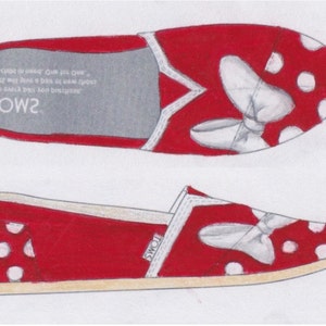 May include: Red canvas slip-on shoes with white polka dots and a white bow design. The shoes have the word "TOMS" printed on the side.