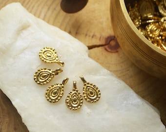 5 brass ornamental pear shaped charms, tribal indian raw brass findings. 18 mm. Lovely for macrame, wire, crafts, beading work