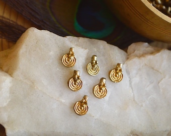 6 small round spiral solid tribal brass charms. Lovely for macrame, wire, crafts, beading work