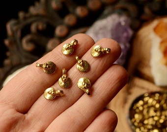 10 Tiny round solid tribal brass charms.  12 mm. Lovely for macrame, wire, crafts, beading work. 10 pieces. 1.5 mm hole