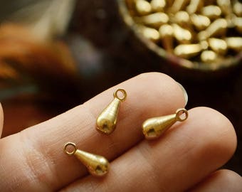 6 Drop shaped solid brass charms. 22 mm. Lovely for macrame, wire, crafts, beading work. 6 pieces. 1.5 mm hole