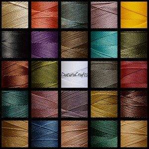 May include: A collection of colourful thread spools in a grid arrangement. Shades include gold, orange, green, purple, and teal. The central spool is white and features the text "DaturaCrafts". The tightly wound threads suggest a crafting or sewing theme.