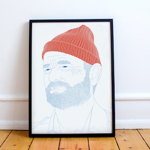 May include: Line art illustration of a person wearing a red knitted beanie and a blue and white patterned shirt. The person has a beard and is looking to the side.