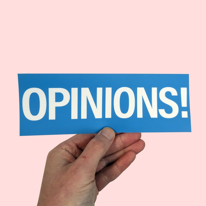 May include: A blue sign with white text that reads "OPINIONS!"