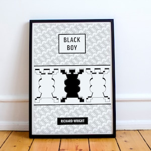 Puede incluir: Póster en blanco y negro con un diseño geométrico. El póster presenta el título "Black Boy" de Richard Wright.