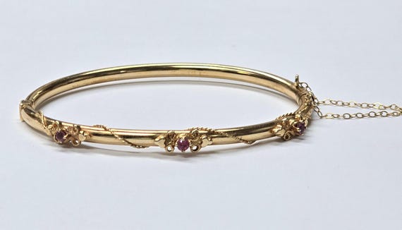 14k Yellow Gold Bangle Bracelet with Delicate Flower and Rope Design
