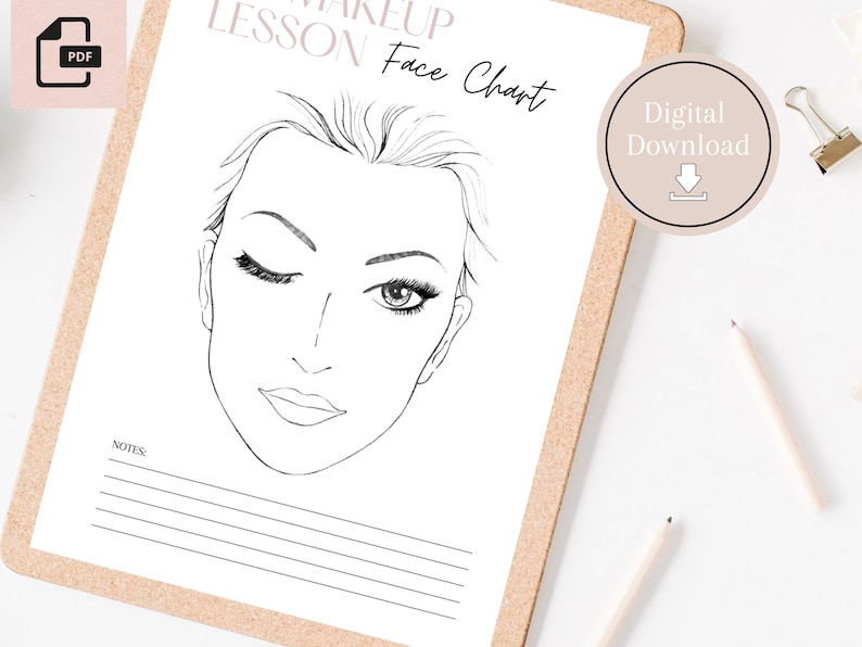 May include: A printable face chart for makeup lessons. The chart features a line drawing of a woman's face with blank spaces for adding makeup details. The text "Face Chart" is written in a decorative font above the drawing. The text "Digital Download" is written in a circle with a download arrow icon.